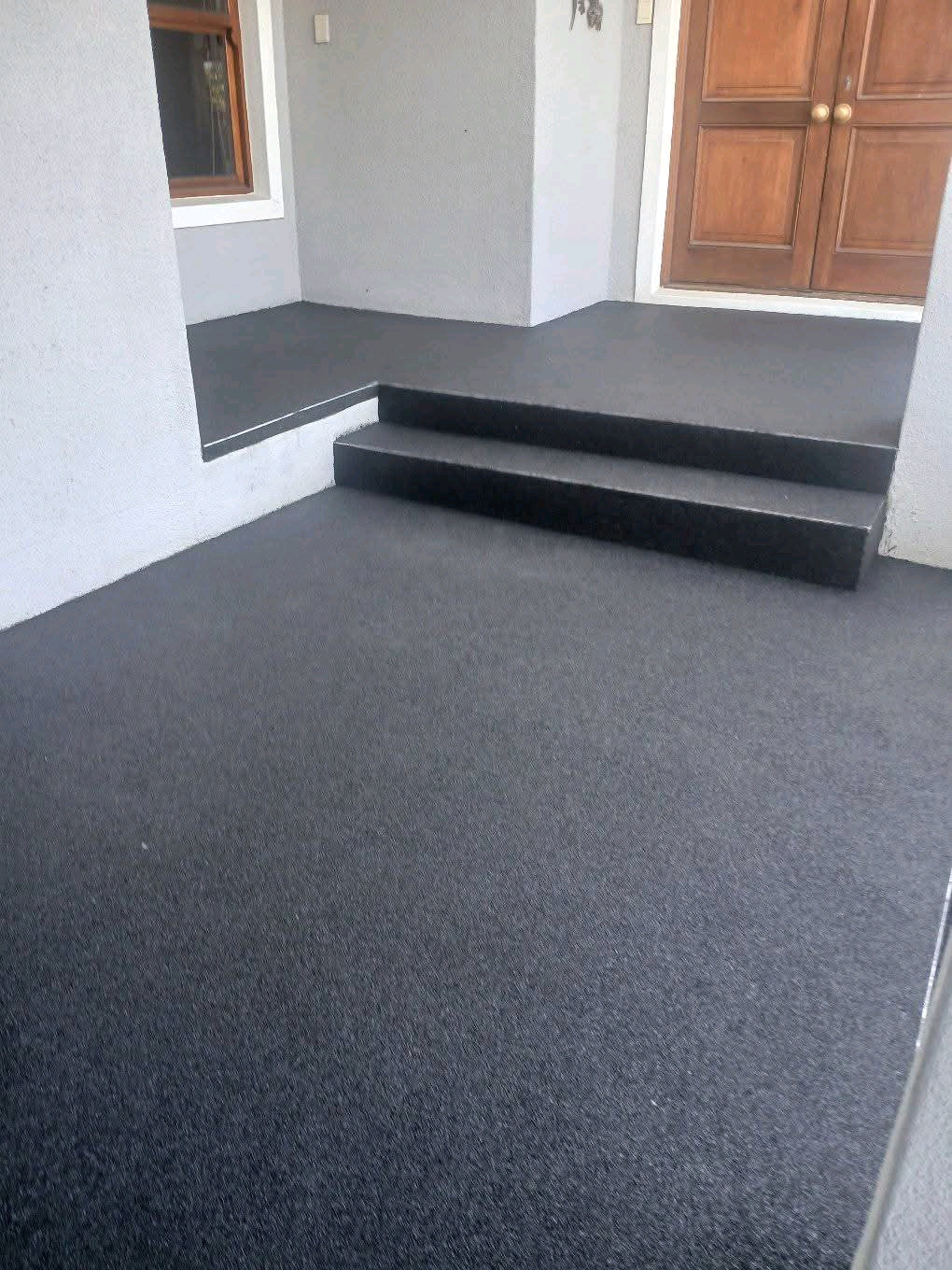 Quartz carpet flooring at home entrance steps